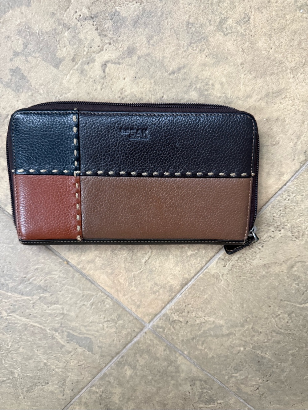 The Sak  Zip-Around Wallet in Black, Brown and Tan Colorblock